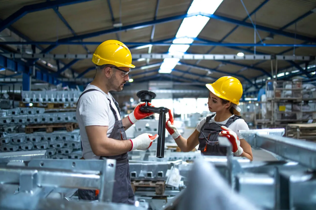 Contextual stock image of personnel working inside an industrial facility